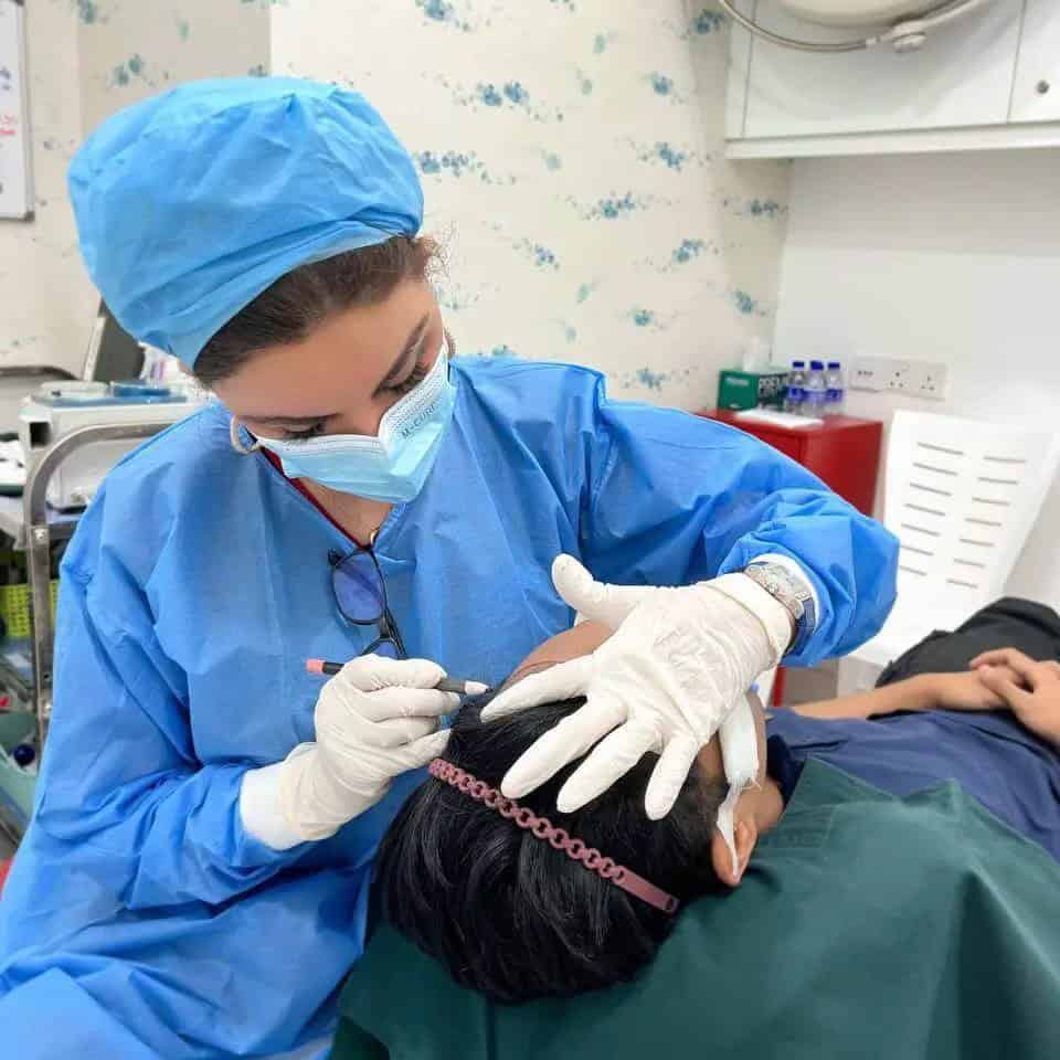 datuk dr inder drawing patient hairline